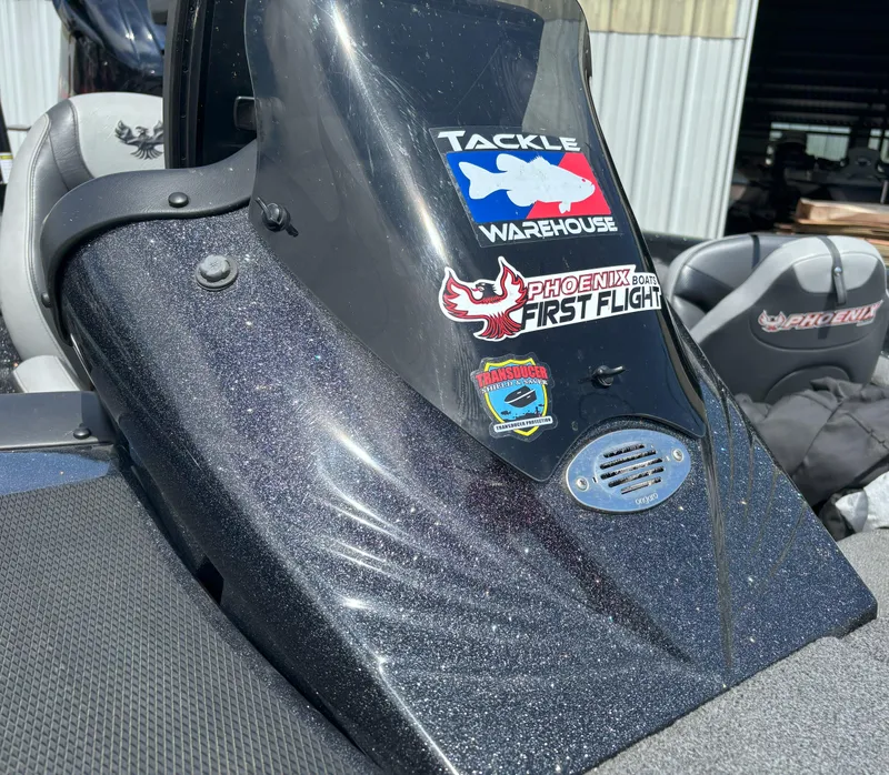 Slide: The Image of 2019 Phoenix 920 PRO XP boat dashboard with Tackle Warehouse and Phoenix Boats First Flight stickers. - 4