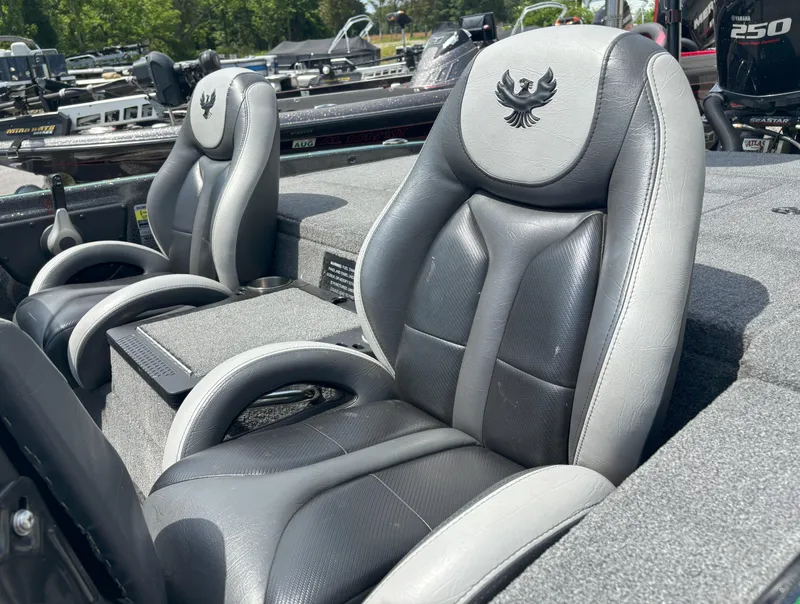 Slide: The Image of 2019 Phoenix 920 PRO XP boat seats with logo, surrounded by other boats. - 6