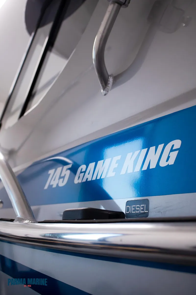 Slide: The Image of 2023 Extreme Boats 745 Game King, diesel model, close-up view. - 11