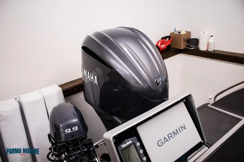 Slide: The Image of 2023 Extreme Boats 745 Game King with Yamaha outboard and Garmin navigation system. - 14