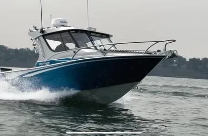 Slide: The Image of 2023 Extreme Boats 745 Game King cruising on water, showcasing sleek design and performance. - 3