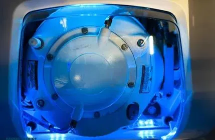 Slide: The Image of 2023 Extreme Boats 745 Game King engine, illuminated in blue light, showcasing mechanical details. - 35