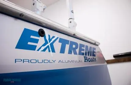Slide: The Image of 2023 Extreme Boats 745 Game King, aluminum hull detail with logo. - 9