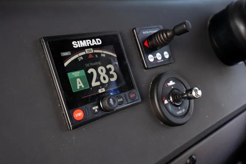 Slide: The Image of Simrad navigation system on 2022 Axopar XC Aft Cabin boat dashboard. - 6