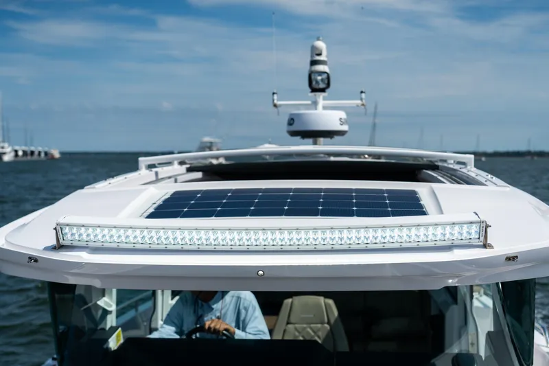 Slide: The Image of 2022 Axopar XC Aft Cabin with solar panel and LED light bar on the roof. - 9