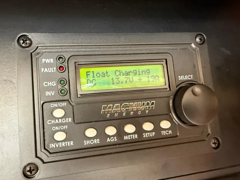 Slide: The Image of Magnum Energy charger display on 2006 Meridian 391 Sedan, showing float charging status. - 14