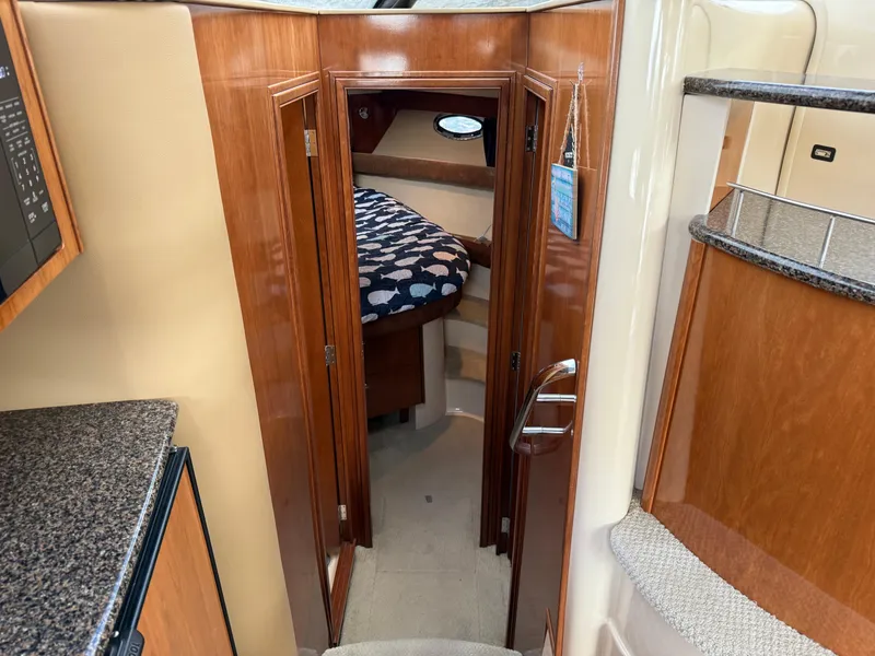 Slide: The Image of Interior of 2006 Meridian 391 Sedan yacht, featuring a cozy cabin entrance. - 18