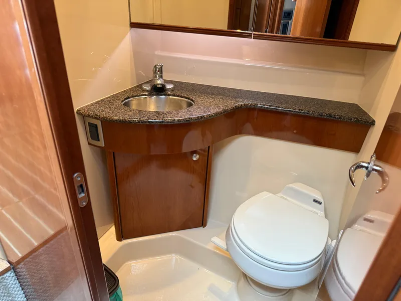 Slide: The Image of Bathroom interior of 2006 Meridian 391 Sedan yacht with sink and toilet. - 29