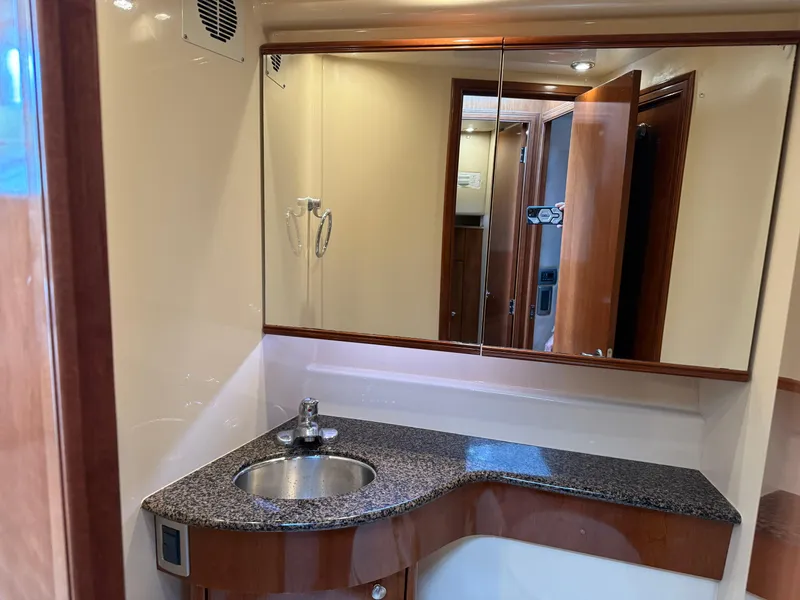 Slide: The Image of 2006 Meridian 391 Sedan bathroom with granite countertop and mirror. - 30
