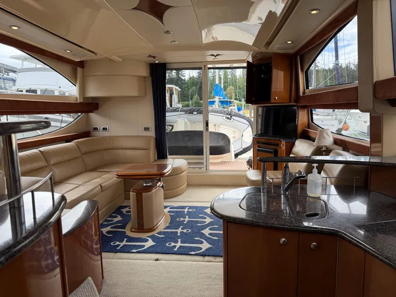 Slide: The Image of Luxurious interior of a 2006 Meridian 391 Sedan yacht with elegant furnishings and modern amenities. - 32