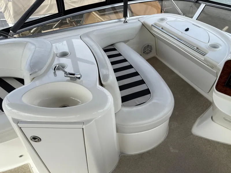Slide: The Image of Interior of 2006 Meridian 391 Sedan yacht with seating and sink area. - 39