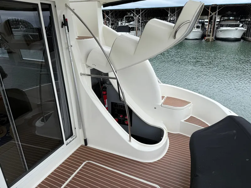 Slide: The Image of 2006 Meridian 391 Sedan yacht with sleek interior and water view. - 44