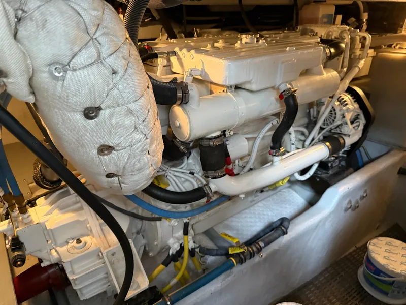 Slide: The Image of Engine of 2006 Meridian 391 Sedan yacht, showcasing detailed mechanical components. - 47