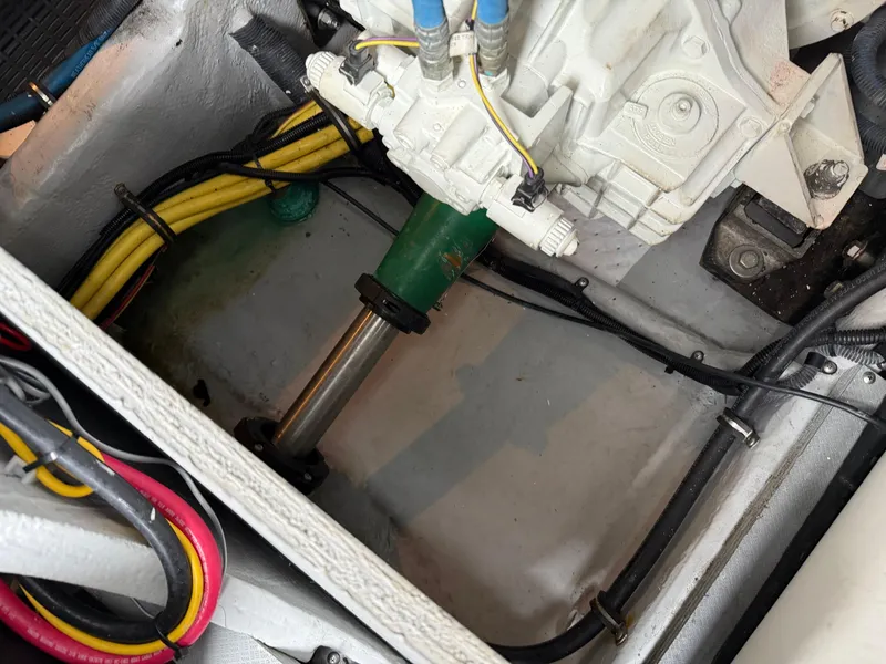 Slide: The Image of Engine compartment of a 2006 Meridian 391 Sedan with visible wiring and components. - 49