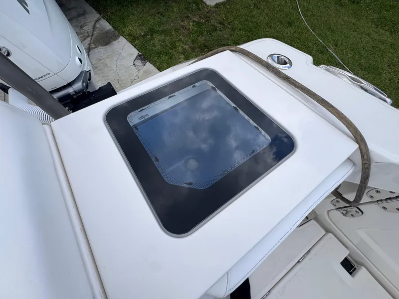 Slide: The Image of 2025 Solace 32 CS boat deck with a glass hatch and strap. - 47