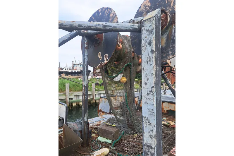 Slide: The Image of Rusty 1979 Custom Steel Trawler Dragger with fishing net and equipment. - 13