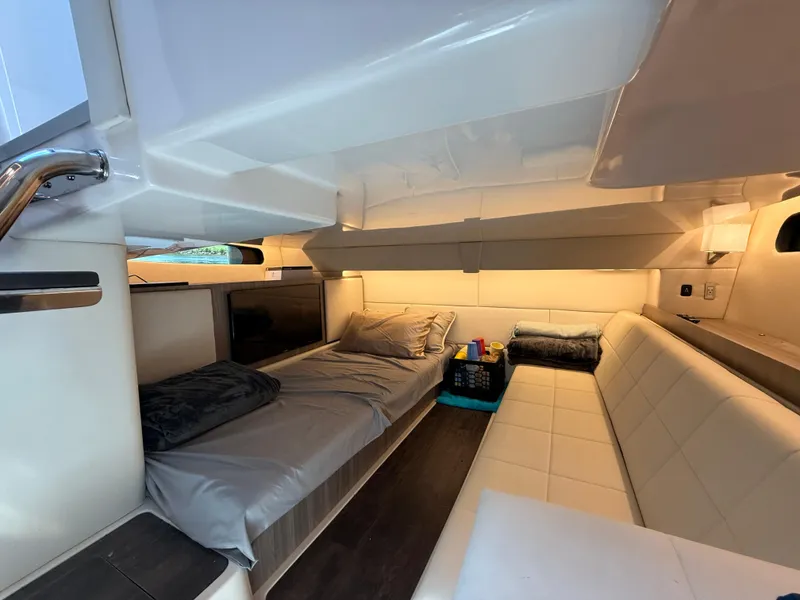 Slide: The Image of Luxurious interior of 2022 Regal 36 Grande Coupe yacht with cozy seating and modern design. - 20