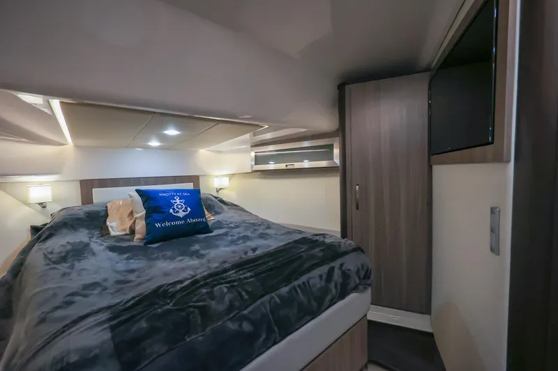 Slide: The Image of Luxurious cabin interior of 2022 Regal 36 Grande Coupe yacht. - 32