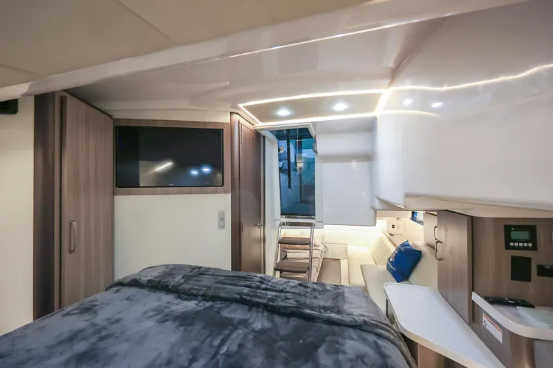 Slide: The Image of Interior of 2022 Regal 36 Grande Coupe, featuring modern design and luxurious amenities. - 33