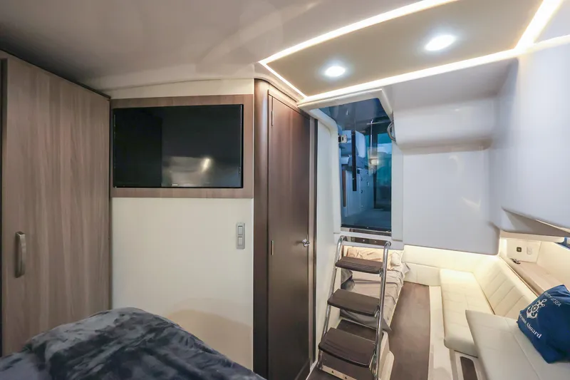 Slide: The Image of Luxurious interior of 2022 Regal 36 Grande Coupe yacht with modern amenities. - 34