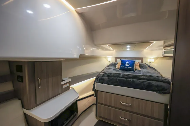 Slide: The Image of Luxurious cabin interior of 2022 Regal 36 Grande Coupe yacht. - 35