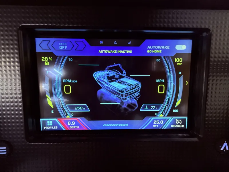 Slide: The Image of 2019 Moomba Craz boat control panel with Autowake display. - 29