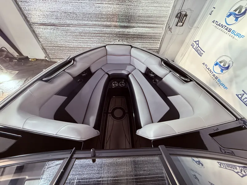 Slide: The Image of Interior of a 2019 Moomba Craz boat with gray upholstery. - 34