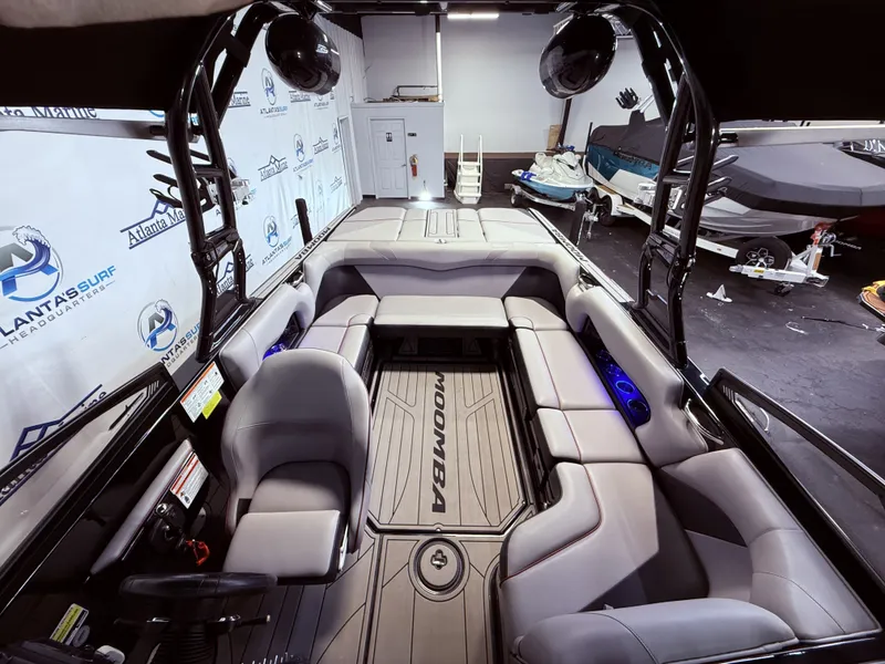 Slide: The Image of Interior of a 2019 Moomba Craz boat with gray seating. - 35