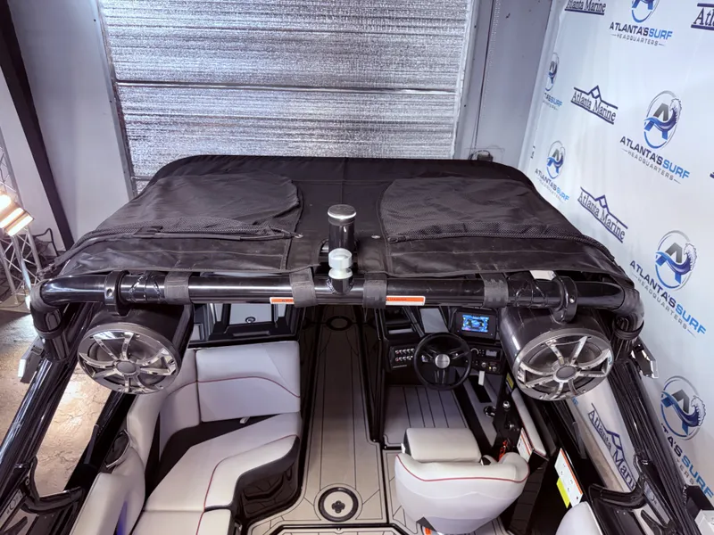 Slide: The Image of Interior view of a 2019 Moomba Craz boat with speakers and control console. - 36