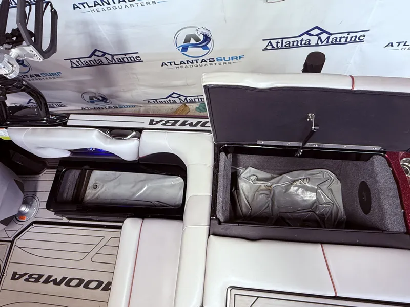 Slide: The Image of Interior of a 2019 Moomba Craz with storage compartments and seating. - 37