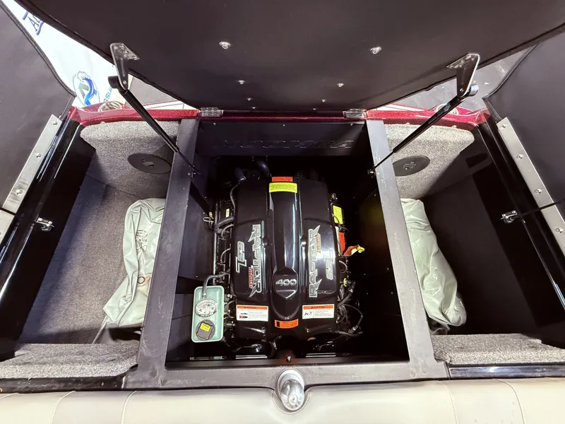 Slide: The Image of Engine compartment of a 2019 Moomba Craz boat with Raptor 400 engine. - 38