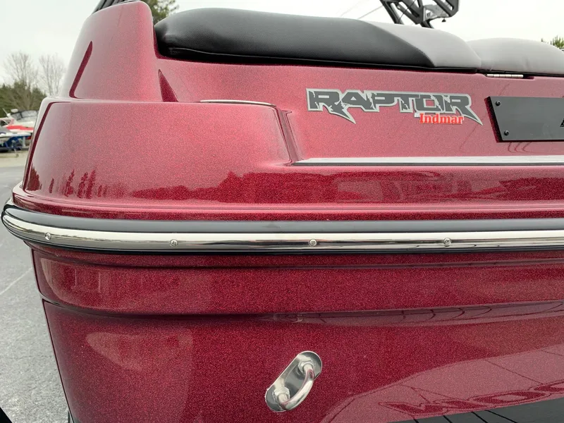 Slide: The Image of 2019 Moomba Craz boat with Raptor Indmar engine, red metallic finish. - 7