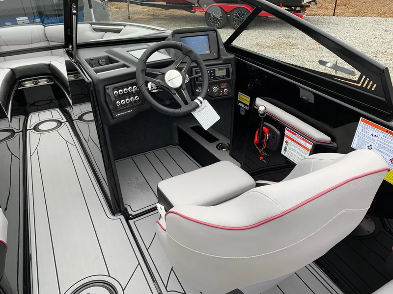 Slide: The Image of 2019 Moomba Craz boat interior with modern dashboard and steering wheel. - 9