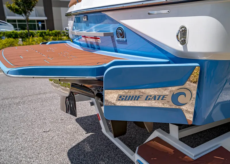 Slide: The Image of 2024 Malibu Wakesetter 24 MXZ with Surf Gate technology, rear view. - 9