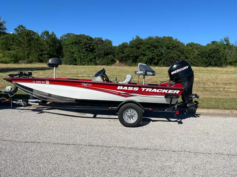 Slide: The Image of 2012 Tracker Pro Team 175 TXW boat with Mercury engine on trailer. - 14