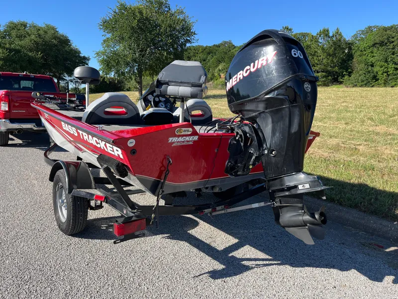 Slide: The Image of 2012 Tracker Pro Team 175 TXW boat with Mercury 60 engine on a trailer. - 16