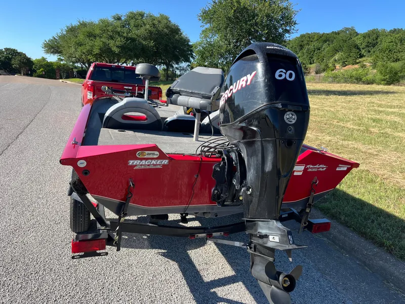 Slide: The Image of 2012 Tracker Pro Team 175 TXW boat with Mercury 60 engine on trailer. - 20