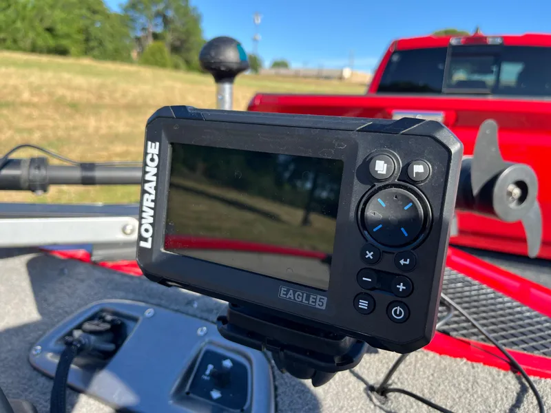 Slide: The Image of Lowrance fish finder on 2012 Tracker Pro Team 175 TXW boat, with red truck in background. - 30