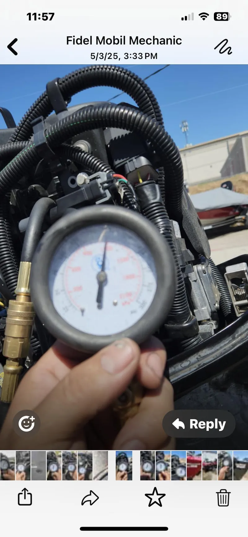 Slide: The Image of Person holding a pressure gauge near a Tracker Pro Team 175 TXW boat engine. - 6