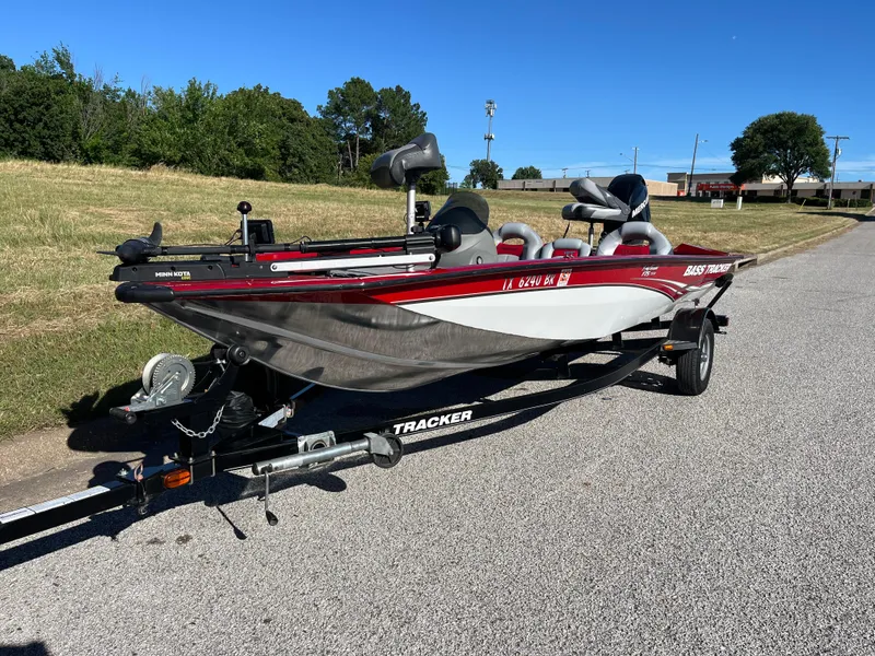 Slide: The Image of 2012 Tracker Pro Team 175 TXW boat on trailer, parked on roadside. - 7