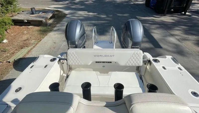 Slide: The Image of 2023 World Cat 260 CC-X boat with dual engines and spacious seating. - 4