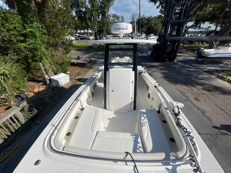 Slide: The Image of 2023 World Cat 260 CC-X boat with Garmin equipment, docked in a marina setting. - 5