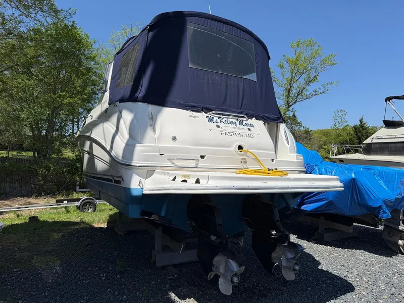 Slide: The Image of 2007 Sea Ray 280 Sundancer boat on trailer, rear view, outdoors. - 2