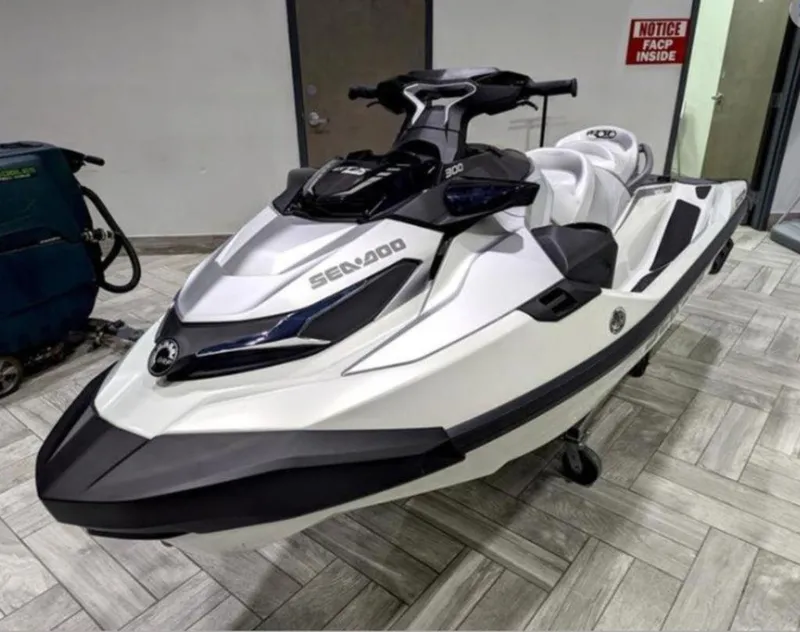 Slide: The Image of 2025 Sea-Doo GTX™ Limited 325 in White Pearl Premium, displayed indoors. - 1
