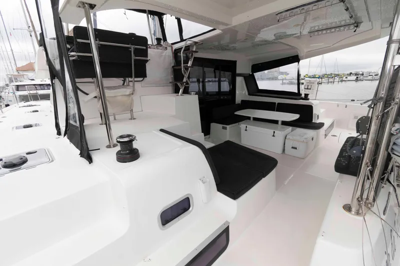 Slide: The Image of 2019 Lagoon 42 yacht interior with sleek seating and modern design. - 10