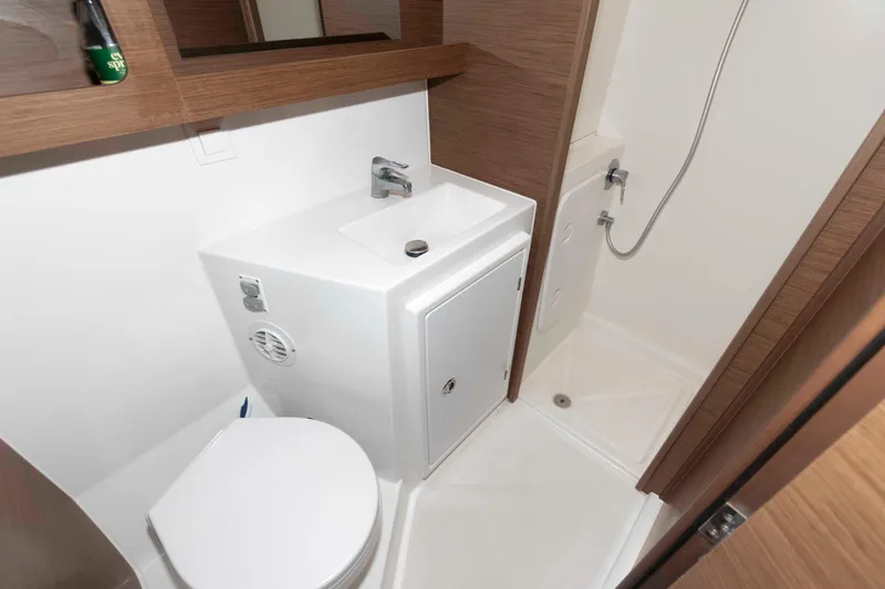 Slide: The Image of Modern bathroom in 2019 Lagoon 42 yacht with shower, sink, and toilet. - 35