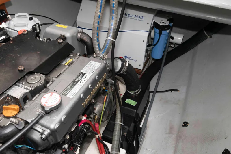 Slide: The Image of Engine room of 2019 Lagoon 42 with Aqua Matic watermaker system. - 42