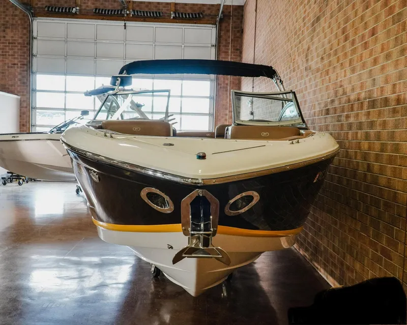 Slide: The Image of 2013 Cobalt A28 boat in indoor storage, front view. - 4