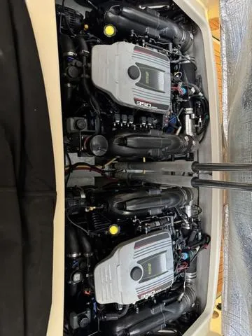 Slide: The Image of 2012 Chris-Craft Launch 28 engine compartment with dual 350 horsepower engines. - 18