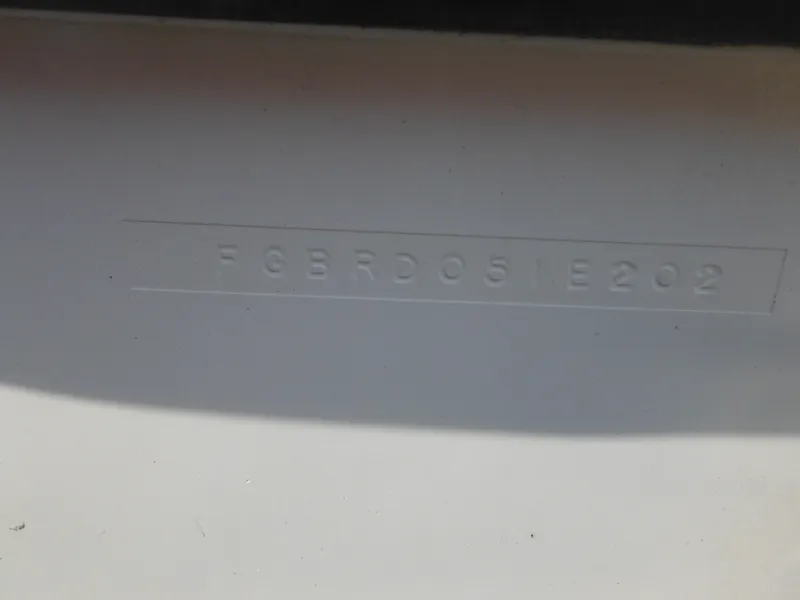 Slide: The Image of Hull identification number on 2002 Robalo R235 Walkaround boat. - 6